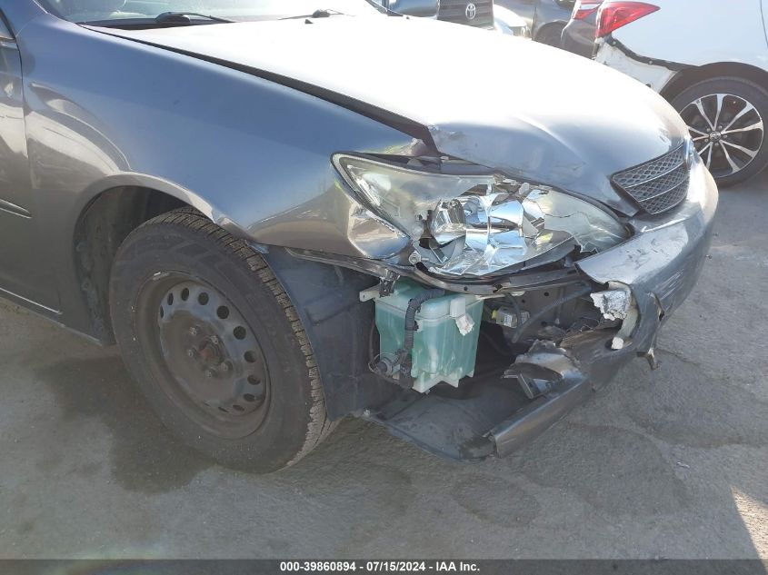 2003 Toyota Camry Le VIN: JTDBE32K330181206 Lot: 39860894