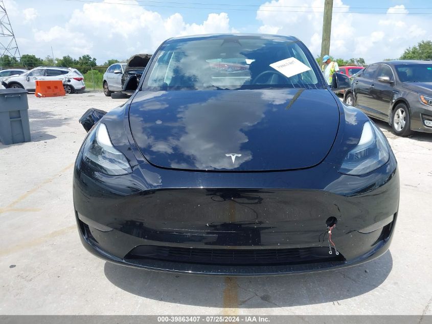 2023 Tesla Model Y Awd/Long Range Dual Motor All-Wheel Drive VIN: 7SAYGDEE5PF623722 Lot: 39863407