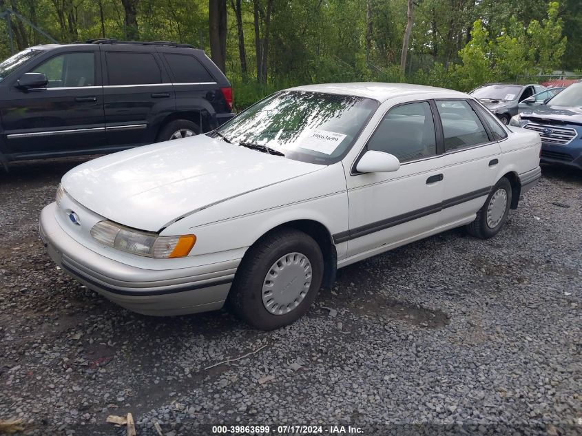 1992 Ford Taurus L VIN: 1FALP50U1NG140099 Lot: 39863699