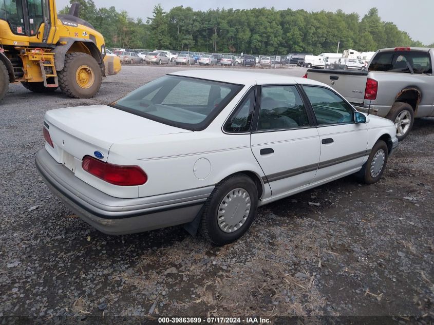 1992 Ford Taurus L VIN: 1FALP50U1NG140099 Lot: 39863699