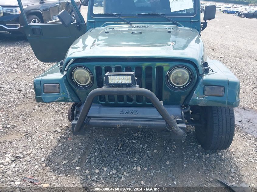 1999 Jeep Wrangler Sahara VIN: 1J4FY49S3XP463647 Lot: 39864760