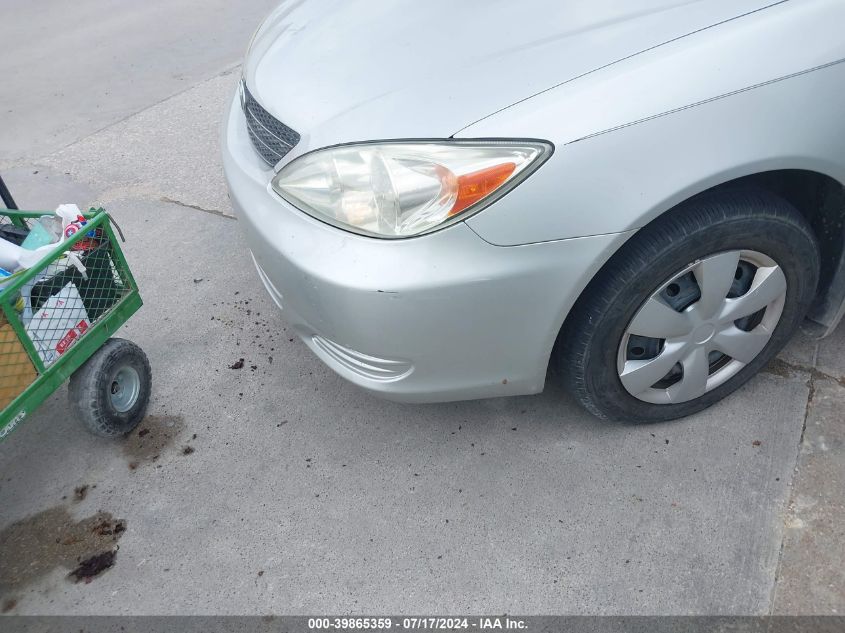 2003 Toyota Camry Le VIN: 4T1BE32K33U694184 Lot: 39865359
