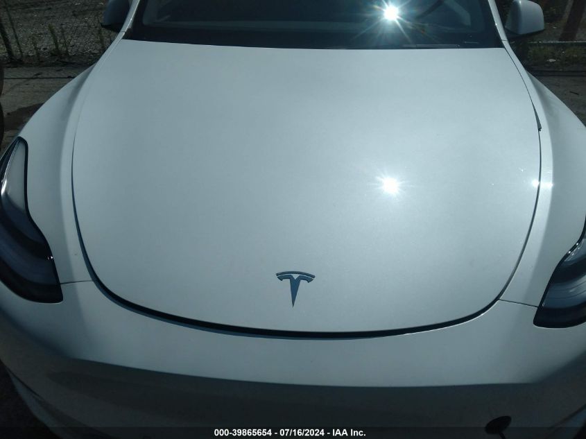 2021 Tesla Model Y Standard Range Rear-Wheel Drive VIN: 5YJYGDED7MF105501 Lot: 39865654