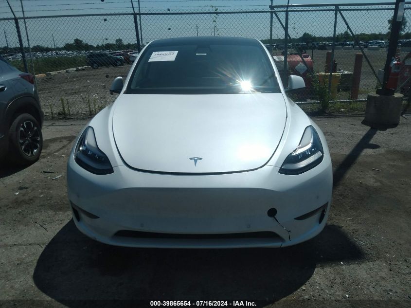 2021 Tesla Model Y Standard Range Rear-Wheel Drive VIN: 5YJYGDED7MF105501 Lot: 39865654