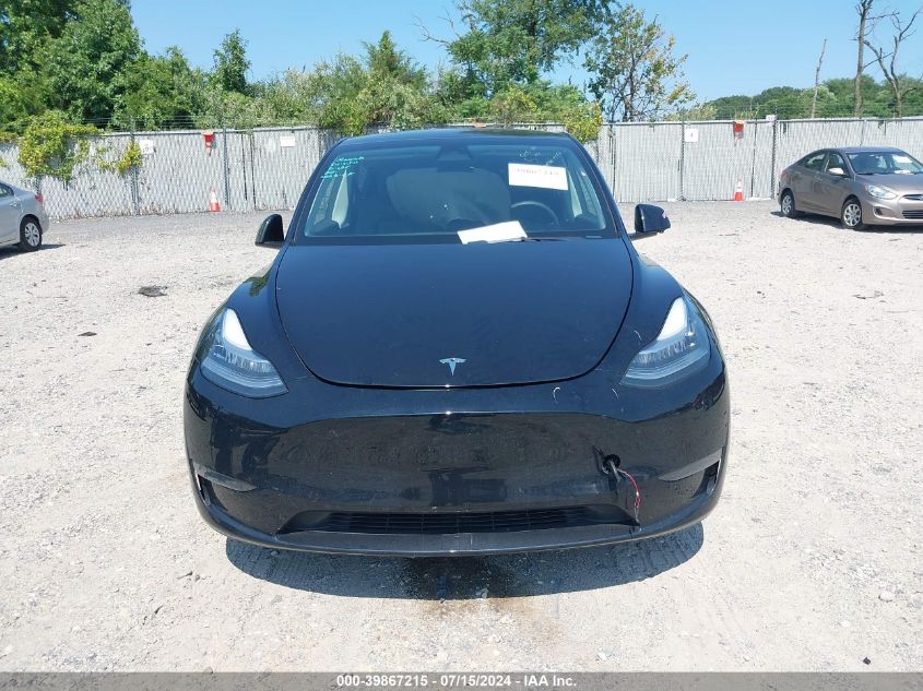 2023 Tesla Model Y Awd/Long Range Dual Motor All-Wheel Drive VIN: 7SAYGDEE5PA058790 Lot: 39867215