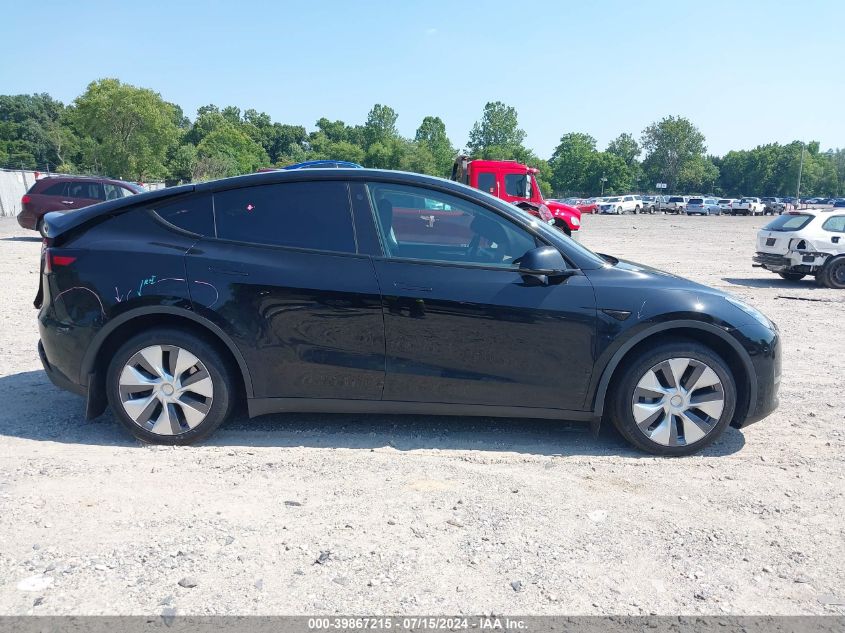 2023 Tesla Model Y Awd/Long Range Dual Motor All-Wheel Drive VIN: 7SAYGDEE5PA058790 Lot: 39867215