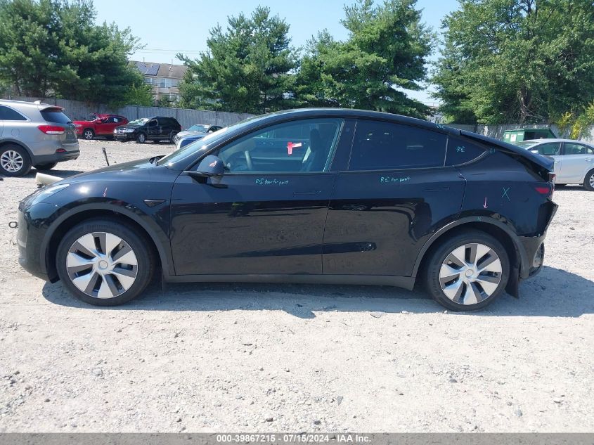 2023 Tesla Model Y Awd/Long Range Dual Motor All-Wheel Drive VIN: 7SAYGDEE5PA058790 Lot: 39867215