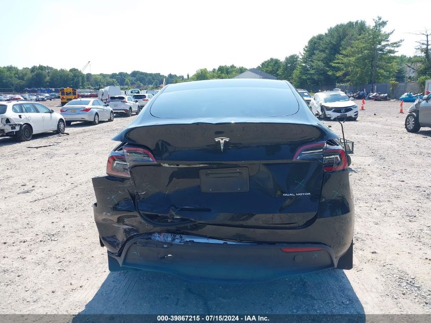 2023 Tesla Model Y Awd/Long Range Dual Motor All-Wheel Drive VIN: 7SAYGDEE5PA058790 Lot: 39867215