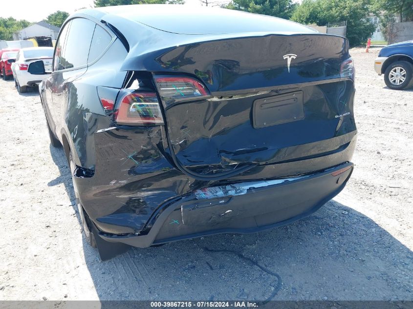 2023 Tesla Model Y Awd/Long Range Dual Motor All-Wheel Drive VIN: 7SAYGDEE5PA058790 Lot: 39867215