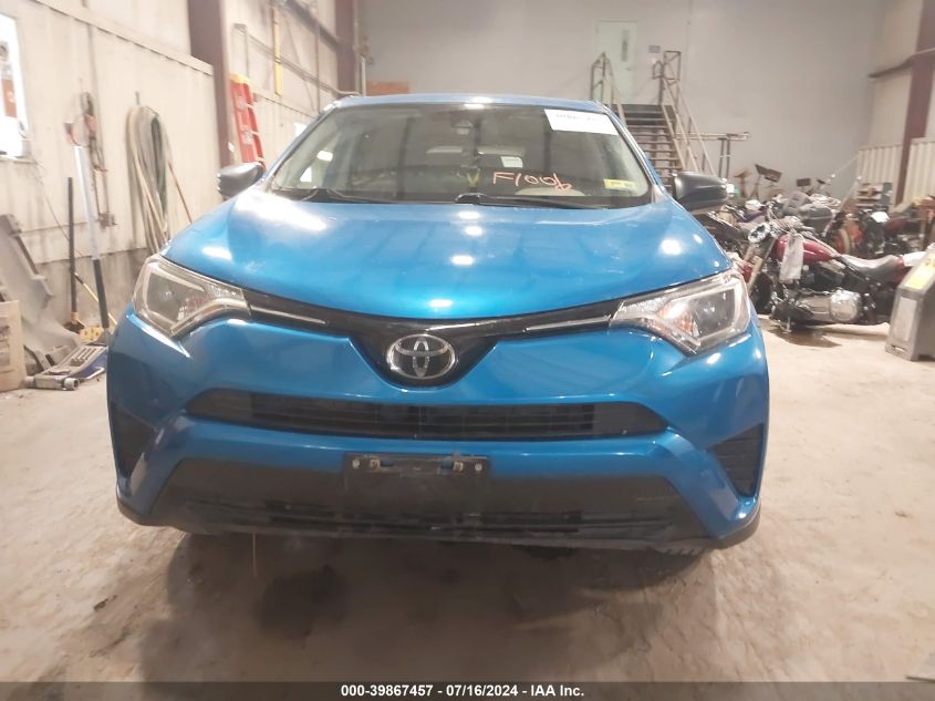 2018 Toyota Rav4 Le VIN: JTMBFREV0JJ176221 Lot: 39867457