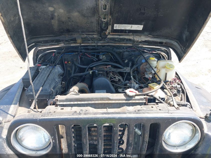 1999 Jeep Wrangler Sport VIN: 1J4FY19S3XP467521 Lot: 39868326