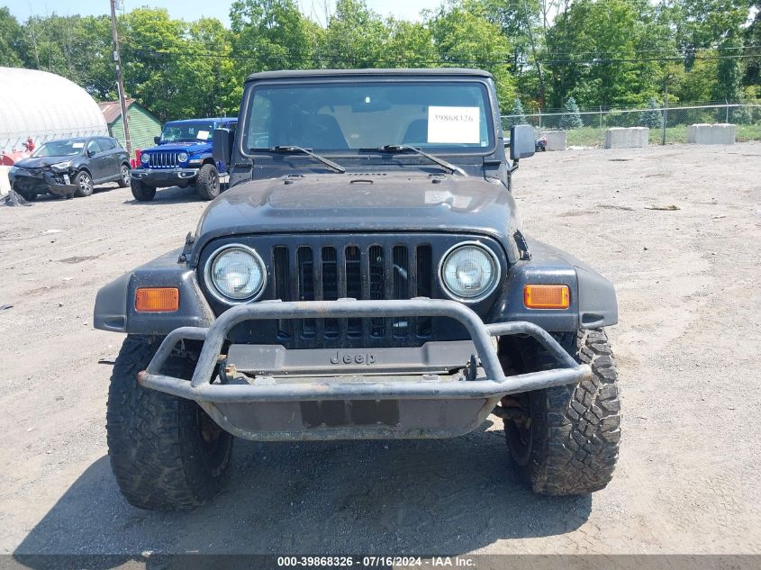1999 Jeep Wrangler Sport VIN: 1J4FY19S3XP467521 Lot: 39868326