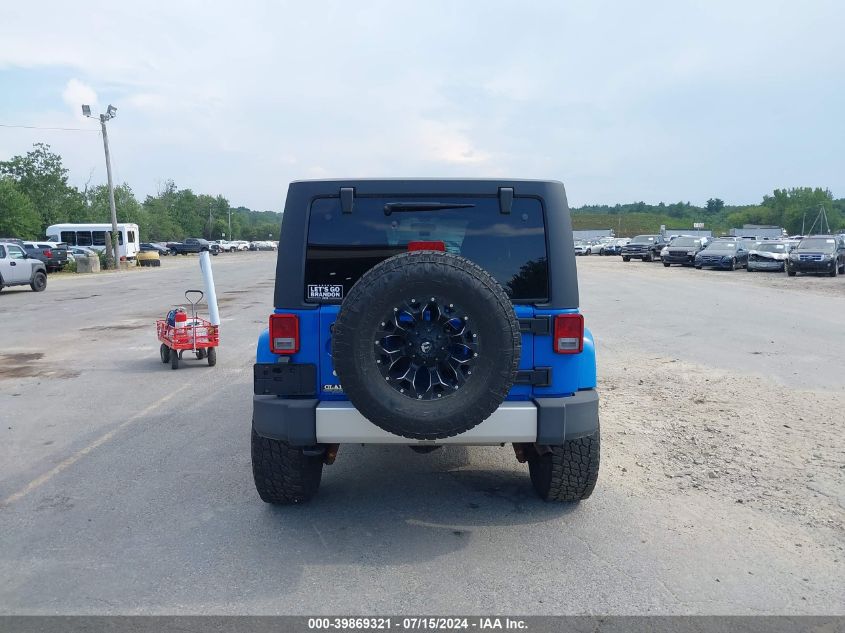 2011 Jeep Wrangler Unlimited Sahara VIN: 1J4BA5H16BL635932 Lot: 39869321