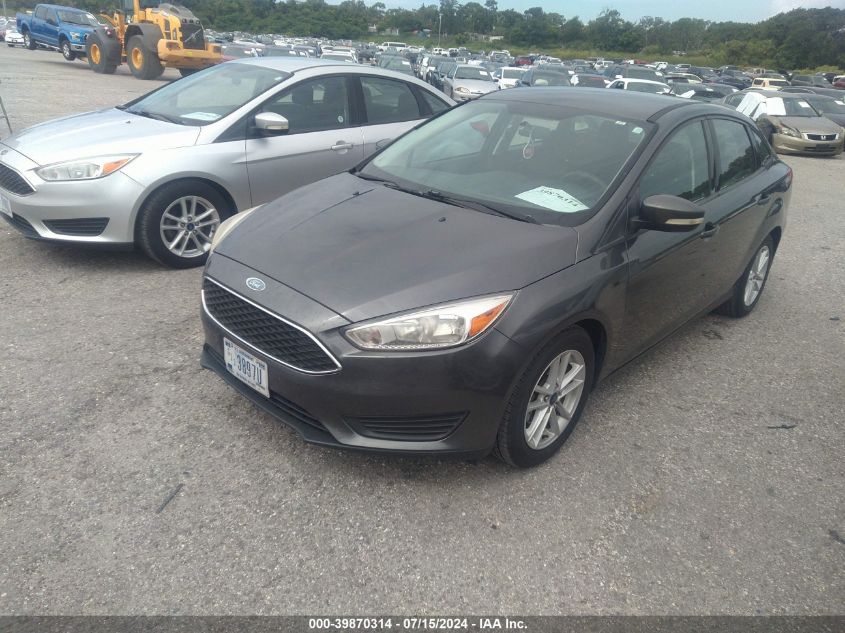 2017 Ford Focus Se VIN: 1FADP3F27HL309519 Lot: 39870314