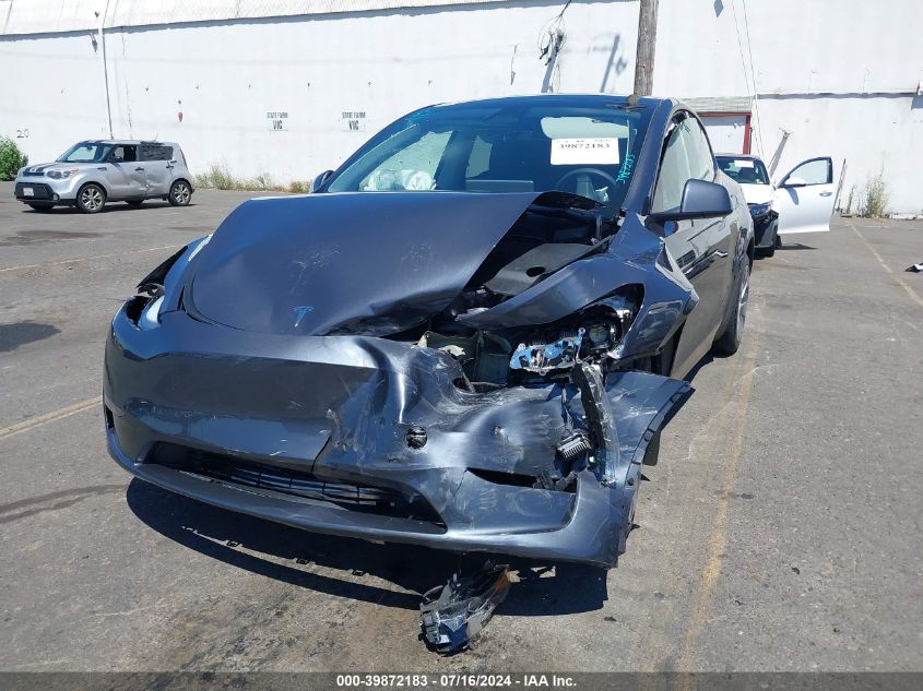 2023 Tesla Model Y Awd/Long Range Dual Motor All-Wheel Drive VIN: 7SAYGDEE9PF685365 Lot: 39872183