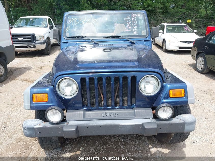 2000 Jeep Wrangler Sport VIN: 1J4FA49S0YP791081 Lot: 39873778