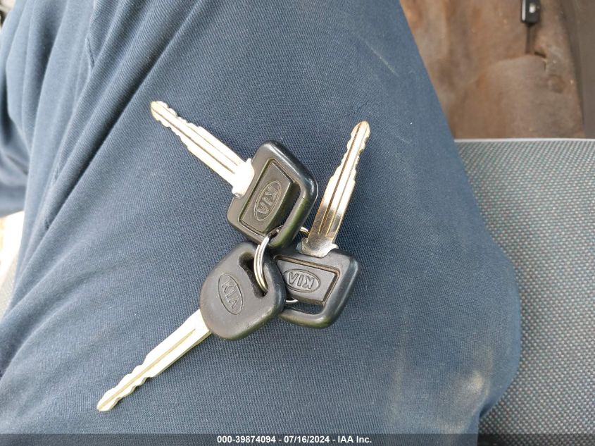 1998 Kia Sportage Ex VIN: KNDJA7234W5552923 Lot: 39874094