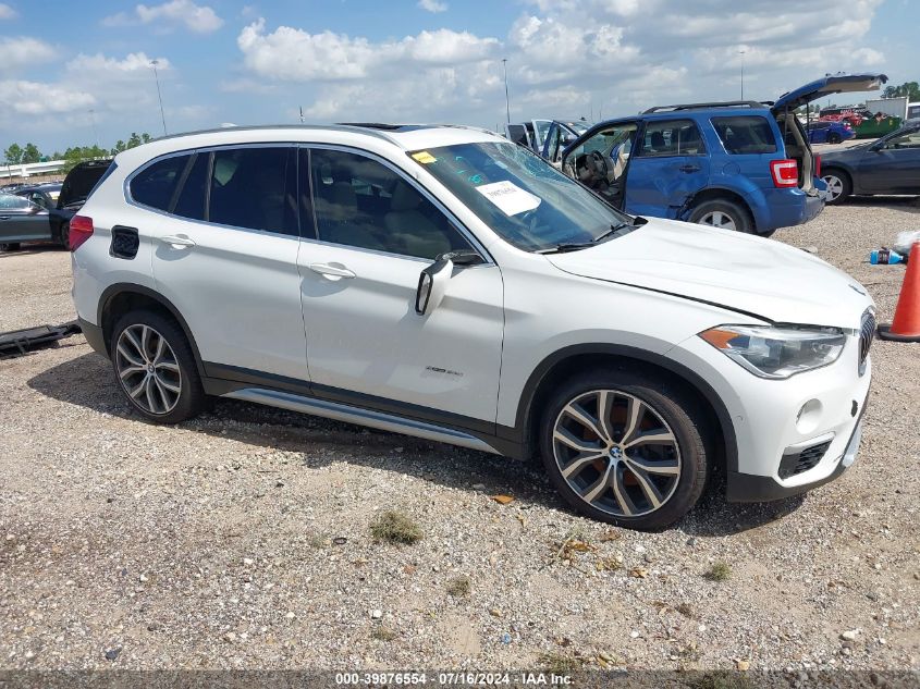 2017 BMW X1 Sdrive28I VIN: WBXHU7C32H5H38084 Lot: 39876554