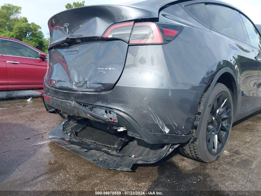 2023 Tesla Model Y Awd/Long Range Dual Motor All-Wheel Drive VIN: 7SAYGDEE3PA180824 Lot: 39878559