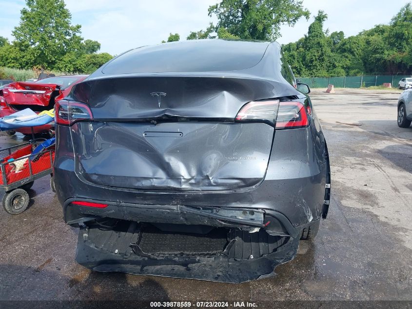 2023 Tesla Model Y Awd/Long Range Dual Motor All-Wheel Drive VIN: 7SAYGDEE3PA180824 Lot: 39878559