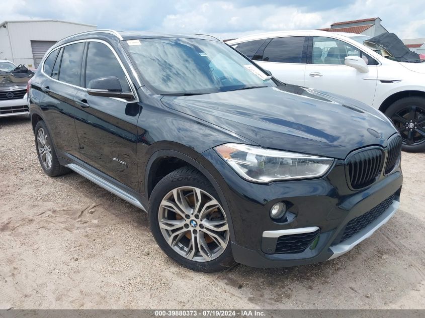 WBXHU7C36H5H38427 2017 BMW X1 - Image 1