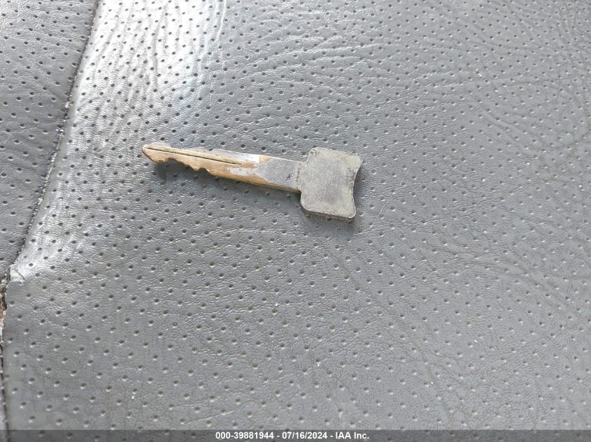 2003 Ford E-150 Commercial VIN: 1FTRE142X3HC05700 Lot: 39881944