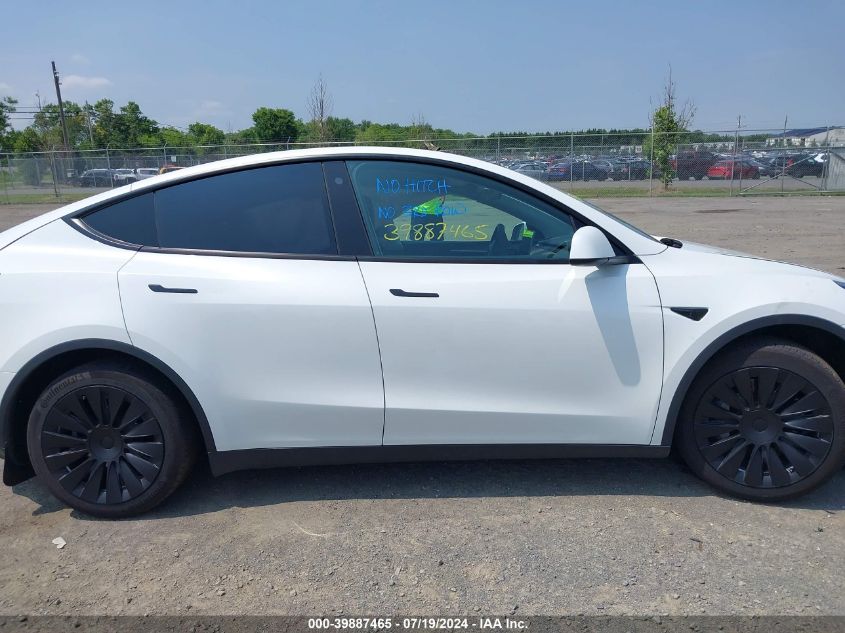 2023 Tesla Model Y Awd/Long Range Dual Motor All-Wheel Drive VIN: 7SAYGDEE1PF611177 Lot: 39887465