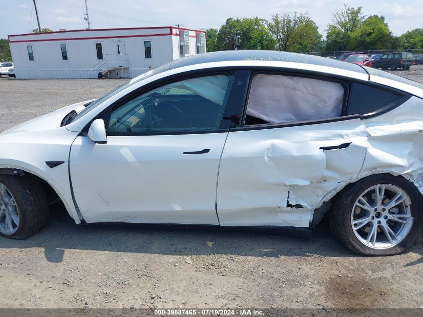 2023 Tesla Model Y Awd/Long Range Dual Motor All-Wheel Drive VIN: 7SAYGDEE1PF611177 Lot: 39887465