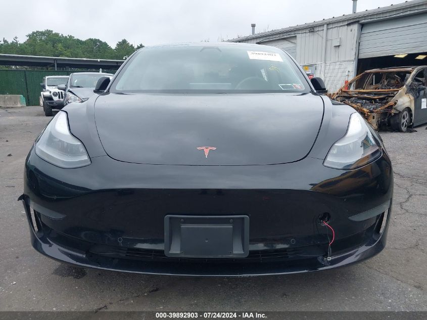 2021 Tesla Model 3 Standard Range Plus Rear-Wheel Drive VIN: 5YJ3E1EAXMF911322 Lot: 39892903