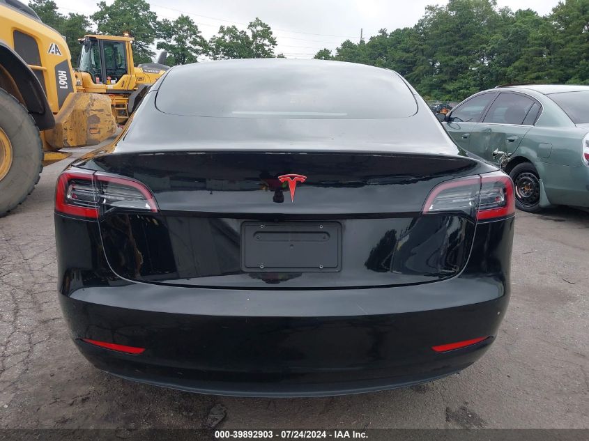 2021 Tesla Model 3 Standard Range Plus Rear-Wheel Drive VIN: 5YJ3E1EAXMF911322 Lot: 39892903