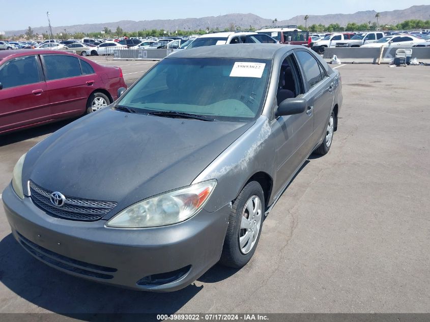 2004 Toyota Camry Le VIN: JTDBE32KX40277089 Lot: 39893022