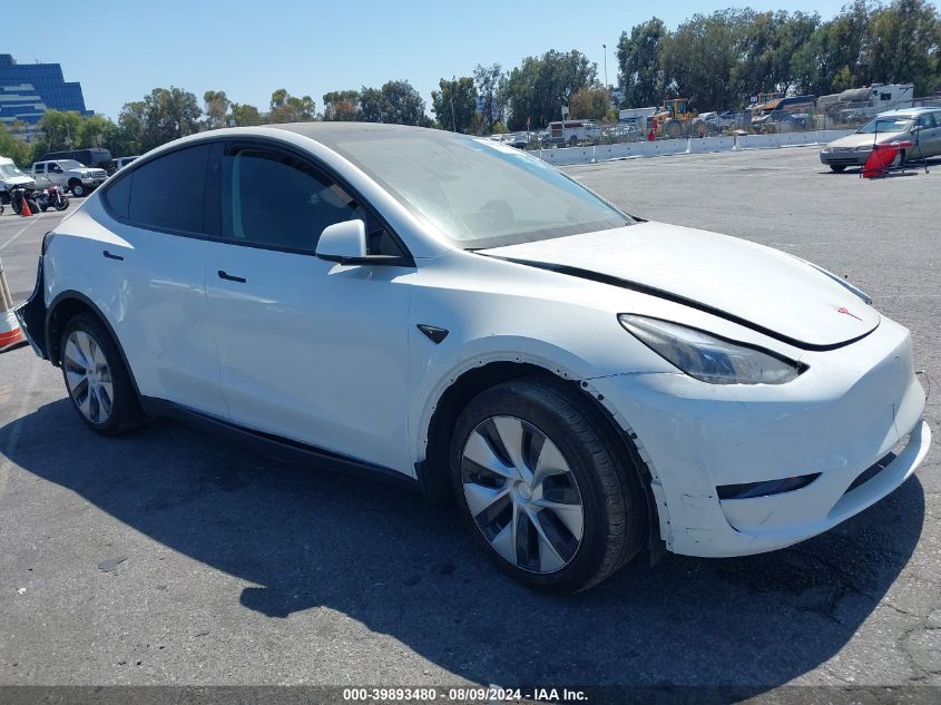 2023 Tesla Model Y Awd/Long Range Dual Motor All-Wheel Drive VIN: 7SAYGDEE9PF807559 Lot: 39893480