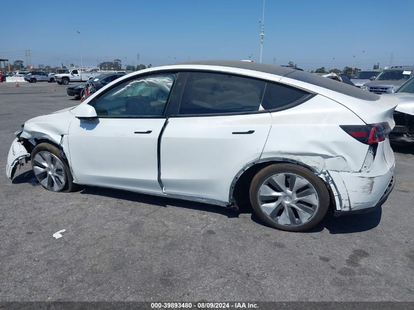 2023 Tesla Model Y Awd/Long Range Dual Motor All-Wheel Drive VIN: 7SAYGDEE9PF807559 Lot: 39893480