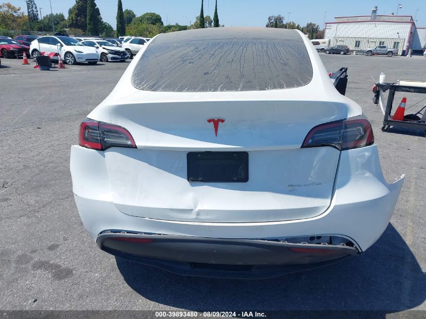 2023 Tesla Model Y Awd/Long Range Dual Motor All-Wheel Drive VIN: 7SAYGDEE9PF807559 Lot: 39893480