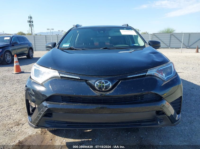 2018 Toyota Rav4 Le VIN: 2T3BFREV4JW823947 Lot: 39894439