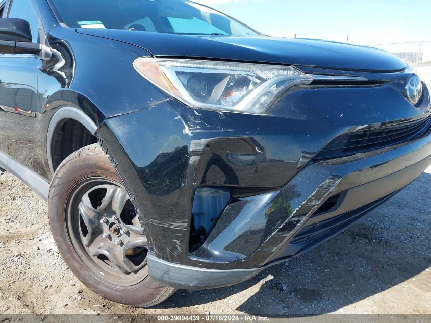 2018 Toyota Rav4 Le VIN: 2T3BFREV4JW823947 Lot: 39894439
