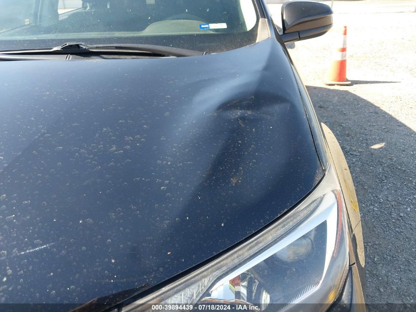 2018 Toyota Rav4 Le VIN: 2T3BFREV4JW823947 Lot: 39894439