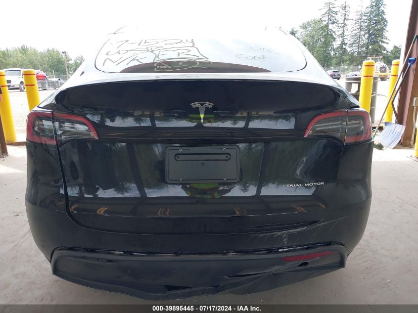 2023 Tesla Model Y Awd/Long Range Dual Motor All-Wheel Drive VIN: 7SAYGDEE9PF880205 Lot: 39895445