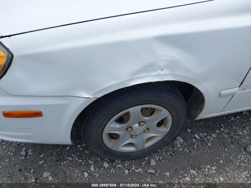 2003 Hyundai Accent Gl VIN: KMHCG35C13U261448 Lot: 39897609