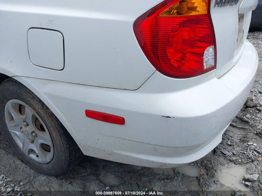 2003 Hyundai Accent Gl VIN: KMHCG35C13U261448 Lot: 39897609