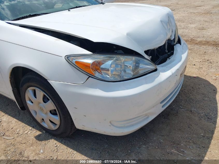 2003 Toyota Camry Le VIN: 4T1BE32KX3U138034 Lot: 39900660