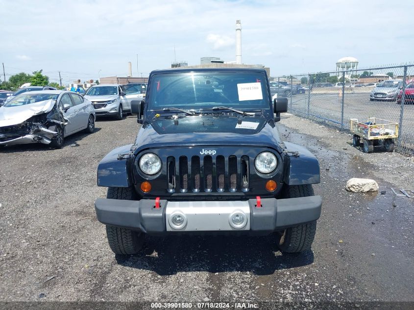 2011 Jeep Wrangler Unlimited Sahara VIN: 1J4HA5H15BL532883 Lot: 39901580