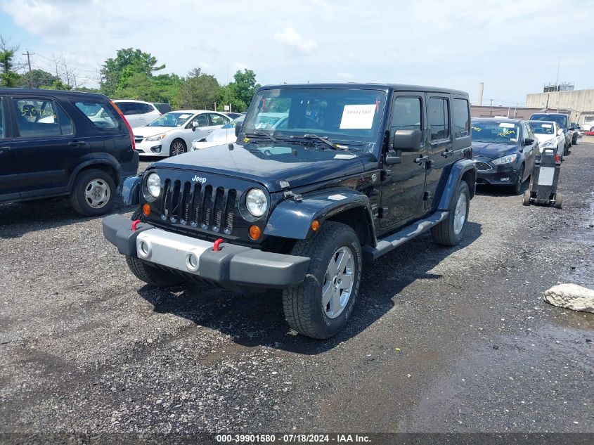 2011 Jeep Wrangler Unlimited Sahara VIN: 1J4HA5H15BL532883 Lot: 39901580