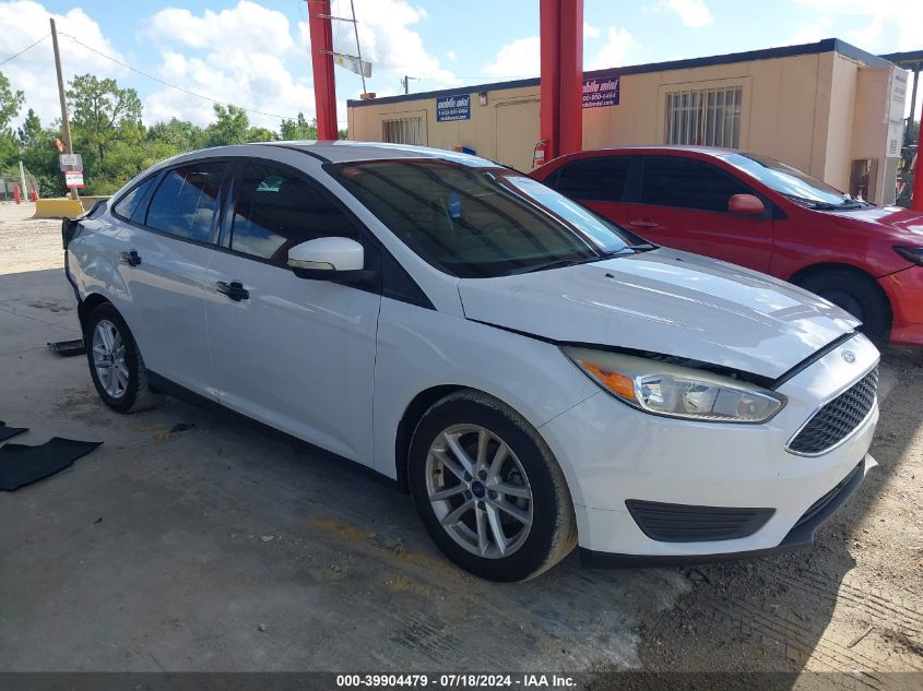 2016 Ford Focus Se VIN: 1FADP3F22GL203963 Lot: 39904479