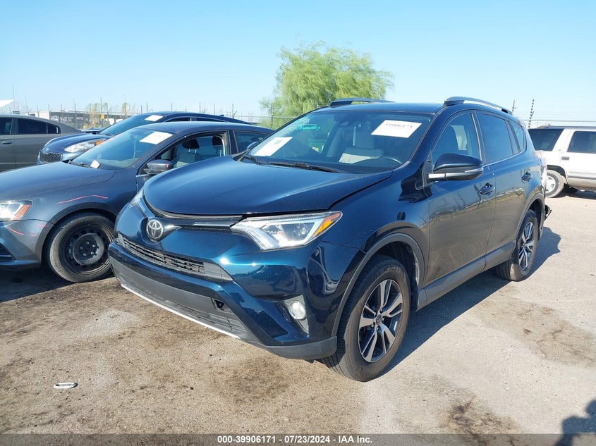 VIN JTMWFREV8JJ157904 2018 TOYOTA RAV4 XLE
