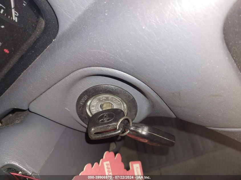 2000 Toyota Camry Le VIN: JT2BG22KXY0461127 Lot: 39906970