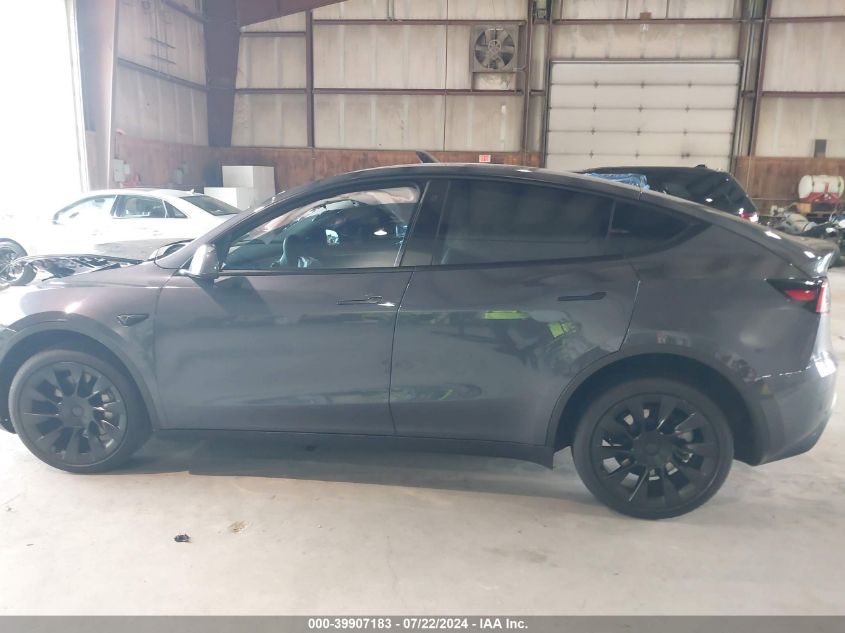 2023 Tesla Model Y Awd/Long Range Dual Motor All-Wheel Drive VIN: 7SAYGDEE9PF676147 Lot: 39907183