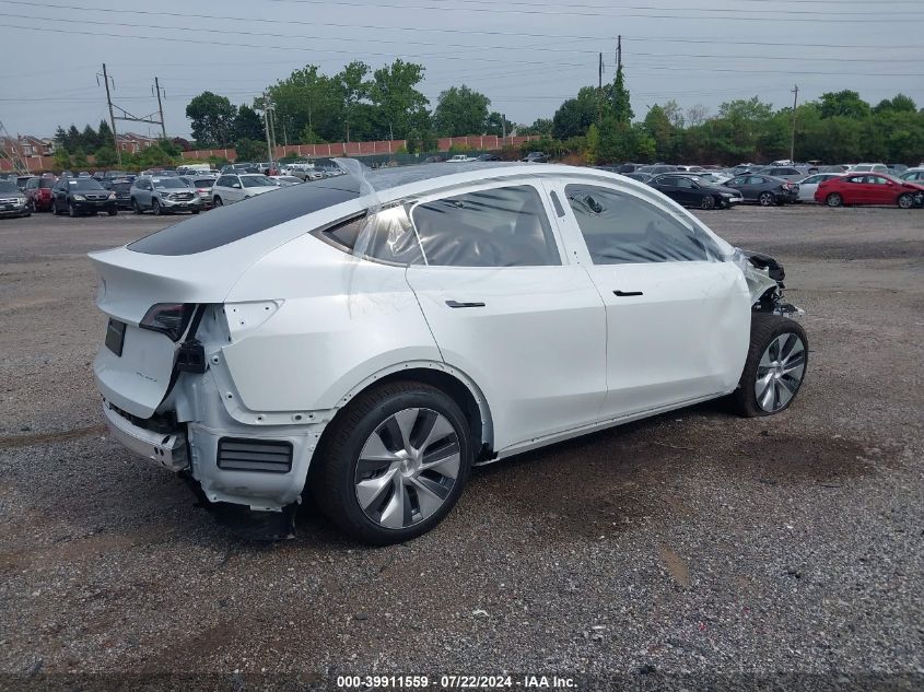 2024 Tesla Model Y Long Range Dual Motor All-Wheel Drive VIN: 7SAYGDEE3RA280098 Lot: 39911559