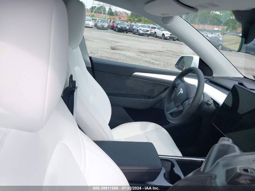 2024 Tesla Model Y Long Range Dual Motor All-Wheel Drive VIN: 7SAYGDEE3RA280098 Lot: 39911559