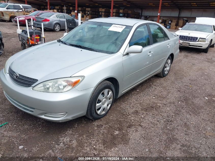 2003 Toyota Camry Le VIN: JTDBE32K330227018 Lot: 39912926